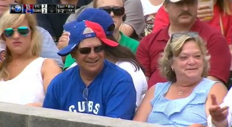 Conflicted fan wears Cubs-Cardinals hat