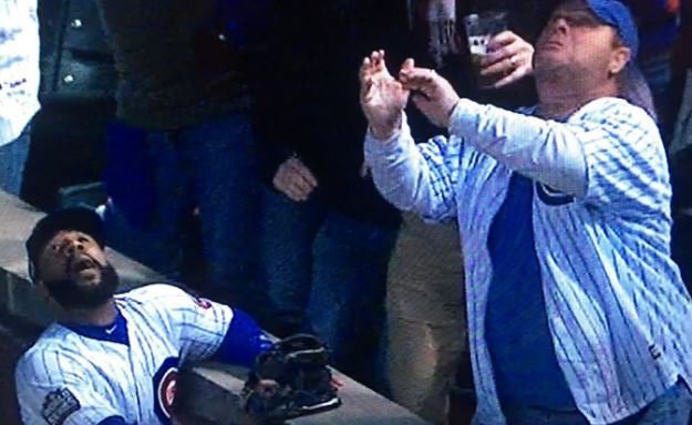 Cubs fan almost messed up big-time on foul ball
