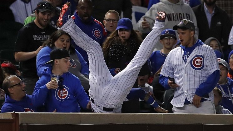 Chicago Cubs infielder Javier Baez went all out to make this play. (Photo Credit: Jim Young-USA TODAY Sports)