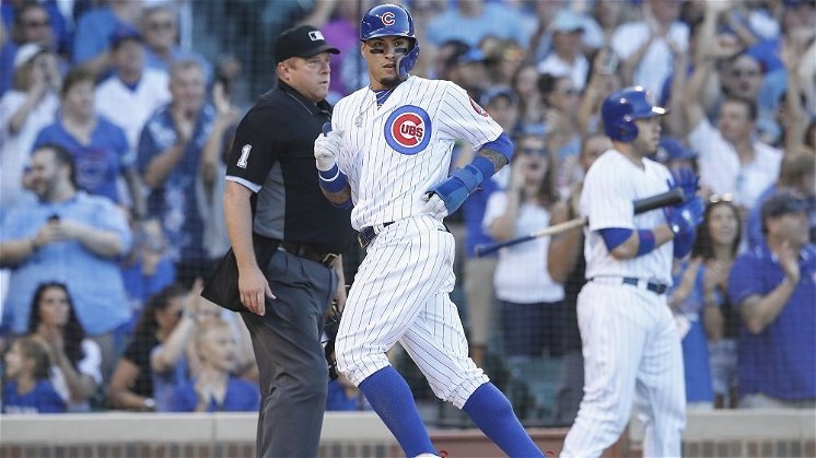 Baez scores winning run as Cubs eke out victory against Reds