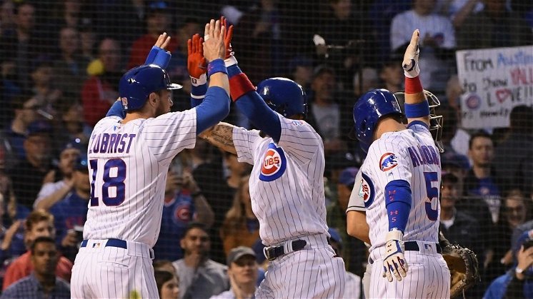 Cubs hit four homers, thrash Marlins at home