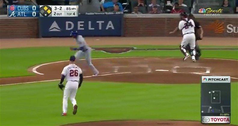 A collision with the umpire behind the plate forced a bad throw from Braves catcher Kurt Suzuki, which led to the Cubs scoring a run.