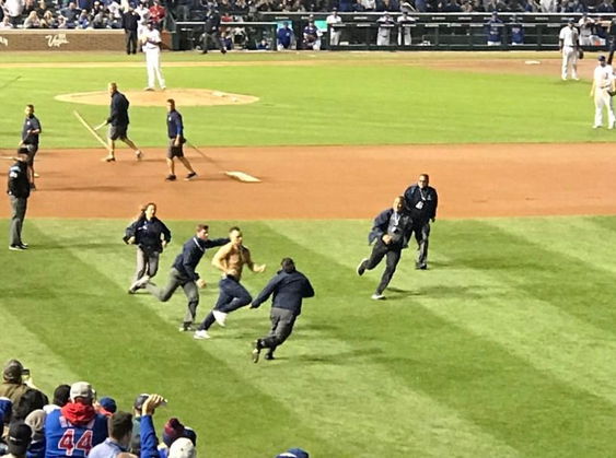 This fan's excess excitement over the Cubs clinching a playoff spot will result in a trespassing charge.