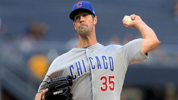Hamels stands out in debut as Cubs throttle Pirates