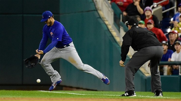 Cubs washed away in rainy opener of doubleheader