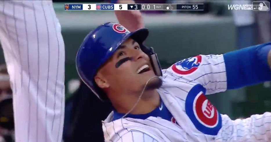 Javier Baez used a characteristic unconventional slide to tab his third triple of the year.