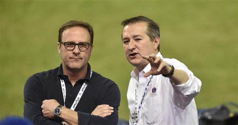 Todd Ricketts (left) works alongside Tom Ricketts (right), his brother, as part of the Chicago Cubs' ownership group. (Credit: David Richard-USA TODAY Sports)