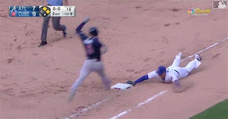 Anthony Rizzo laid out in order to collect the game-winning out at first base.