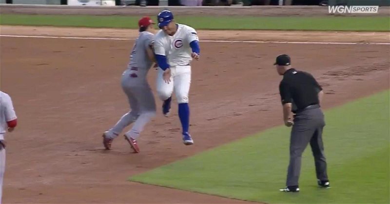 Cubs first baseman Anthony Rizzo paid the price for Reds second baseman Derek Dietrich's questionable gamesmanship.