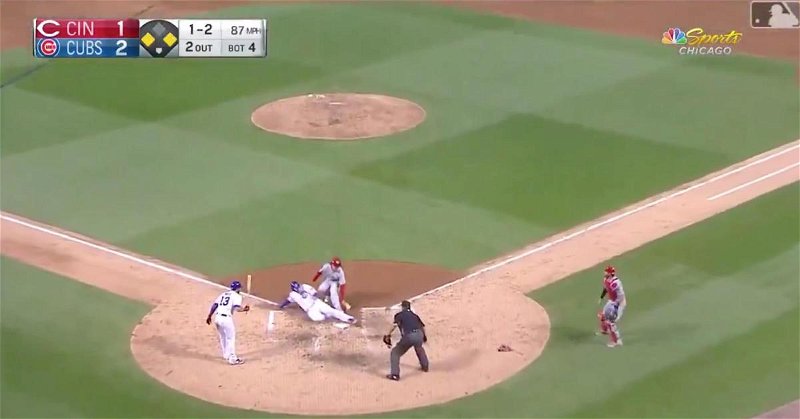 Cubs first baseman Anthony Rizzo galloped to the plate on a wild pitch and slid in safely.
