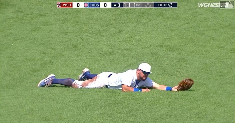 Chicago Cubs left fielder Kyle Schwarber went all out for a spectacular diving catch on Sunday.