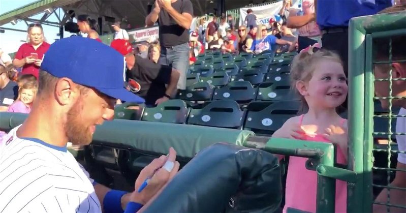 Always a class act, Ben Zobrist took the time before Friday's game to sign autographs for fans.