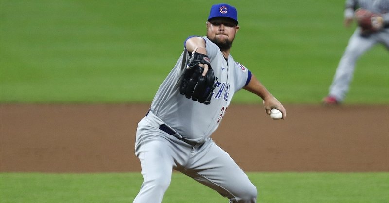 Jon Lester pitches five innings of no-hit ball as Cubs stave off Reds