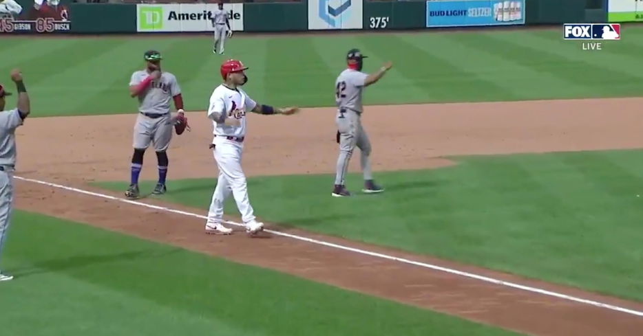 Yadier Molina was baffled after a chopper hit by Matt Carpenter was ruled fair, leading to a game-ending double play at Busch Stadium.