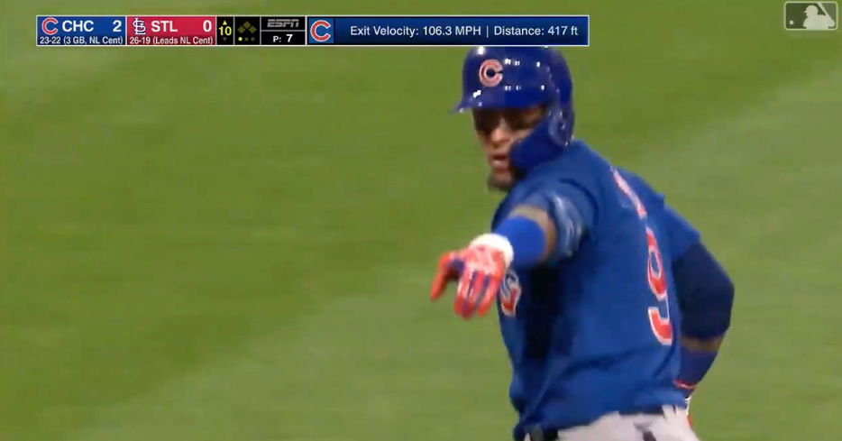 Javier Baez appeared to playfully taunt some onlooking Cardinals fans after crossing the plate.