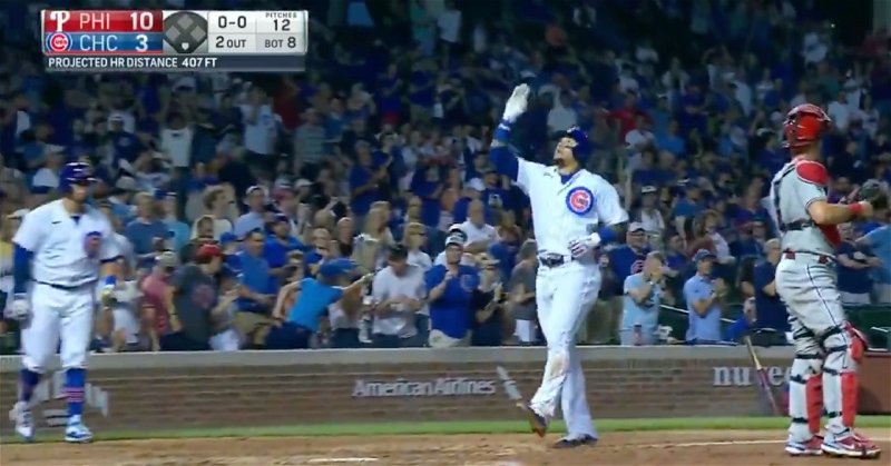 With two outs in the eighth inning, Javier Baez drove a 407-foot dinger into the right field bleachers at the Friendly Confines.