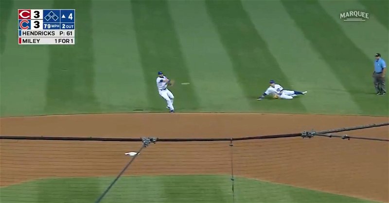 David Bote quickly got to his feet and threw to first base after pulling off a sliding stop at the edge of the outfield grass.