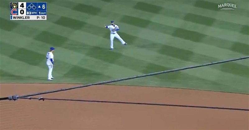 Cubs second baseman David Bote made a superb throw across his body, resulting in an out.
