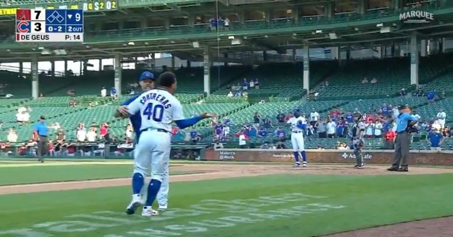 Willson Contreras charged onto the field in order to confront Pat Hoberg and was restrained by David Ross.