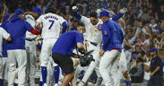 Fly the W: Tauchman walks off White Sox in Cubs win