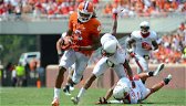 No. 12 Clemson tops Ball St. 52-27 in record-setting day 