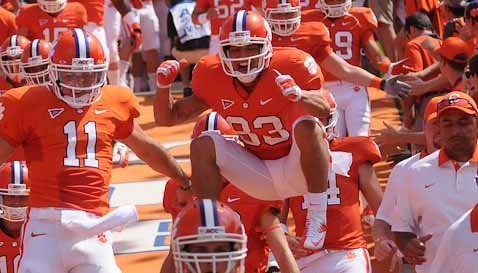 Rodriguez proud to carry American flag and honor Clemson's military tradition