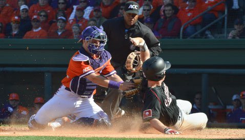 Clemson's Chis Okey putting on the tag against South Carolina.