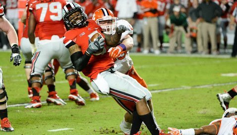 Spencer Shuey with a big tackle against OSU in the Orange Bowl.