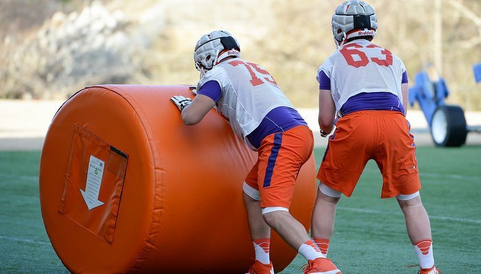 Mitch Hyatt and Jake Fruhmorgen work out during spring camp 
