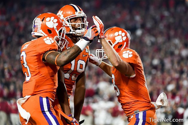 Peake, Scott and Renfrow celebrate after a big play against Alabama