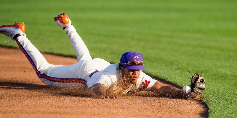 Jordan Greene goes after a grounder (Photo by David Grooms)