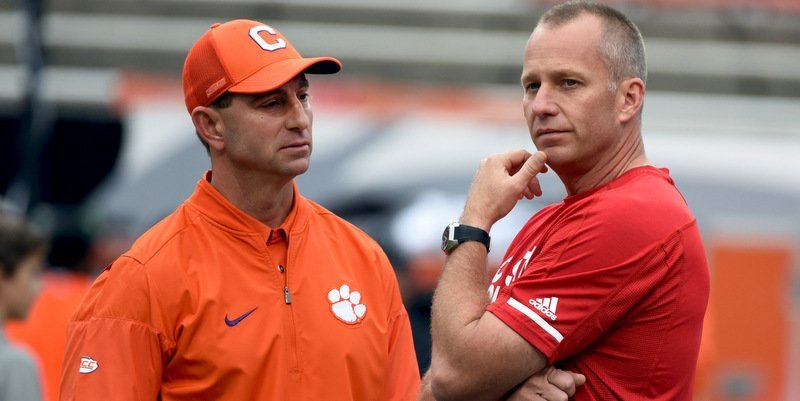 Dave Doeren (left) questioned the use of the laptop after his teams loss to Clemson (Photo by Rob Kinnan, USAT)