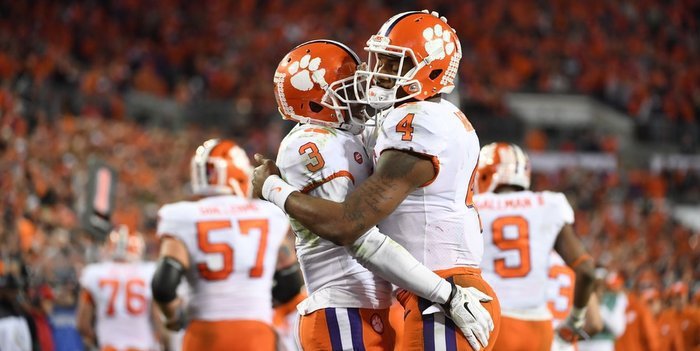 Watson and Scott celebrate during win over Alabama