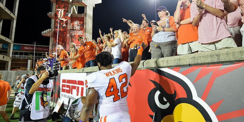 Wilkins celebrating with fans after big win against UL