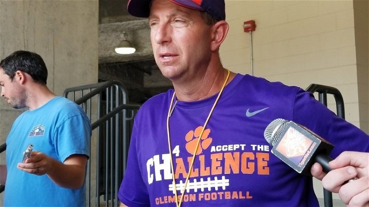 Swinney shows off the t-shirt following Tuesday's scrimmage 