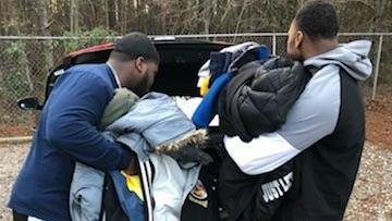 Clemson commit gives back to his community, gathering coats for those in need