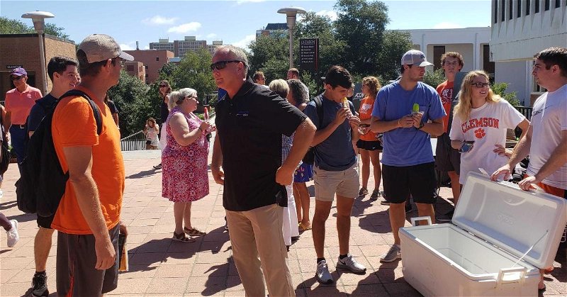 Former college coach and now ACC Network analyst Mark Richt was among a group with some giveaways for students Wednesday.