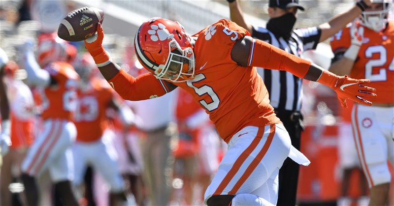 KJ Henry and Clemson defense is scheduled to head back on the road next week. (ACC photo)