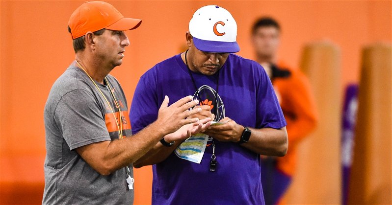 Dabo Swinney and Tony Elliott each have some job security with Swinney having a case full of trophies and Elliott playing a big part in that and starting fresh at Virginia.