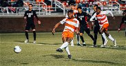 Diop late penalty kick lifts No. 1 Tigers over Wolfpack