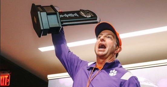 Swinney excited after receiving the ACC Atlantic trophy (Photo courtesy: Clemson Football Twitter)