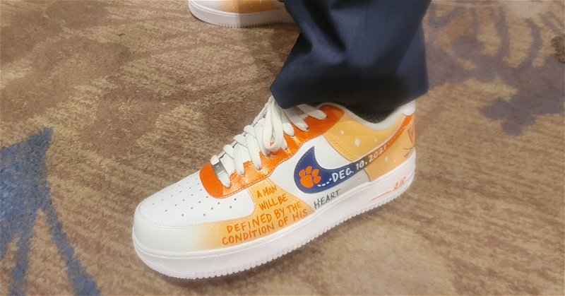 Elliott pays tribute to Clemson and UVa with custom shoes, seeks to build model program