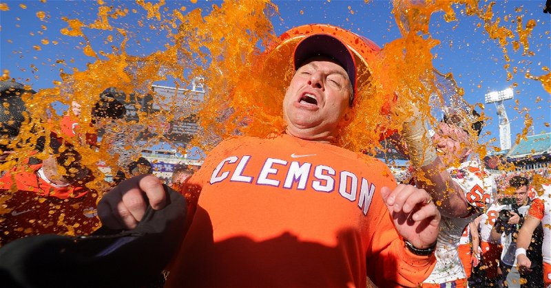 Swinney was surprised with the Gatorade bath after the win (Nathan Ray Seebeck - USA Today Sports)